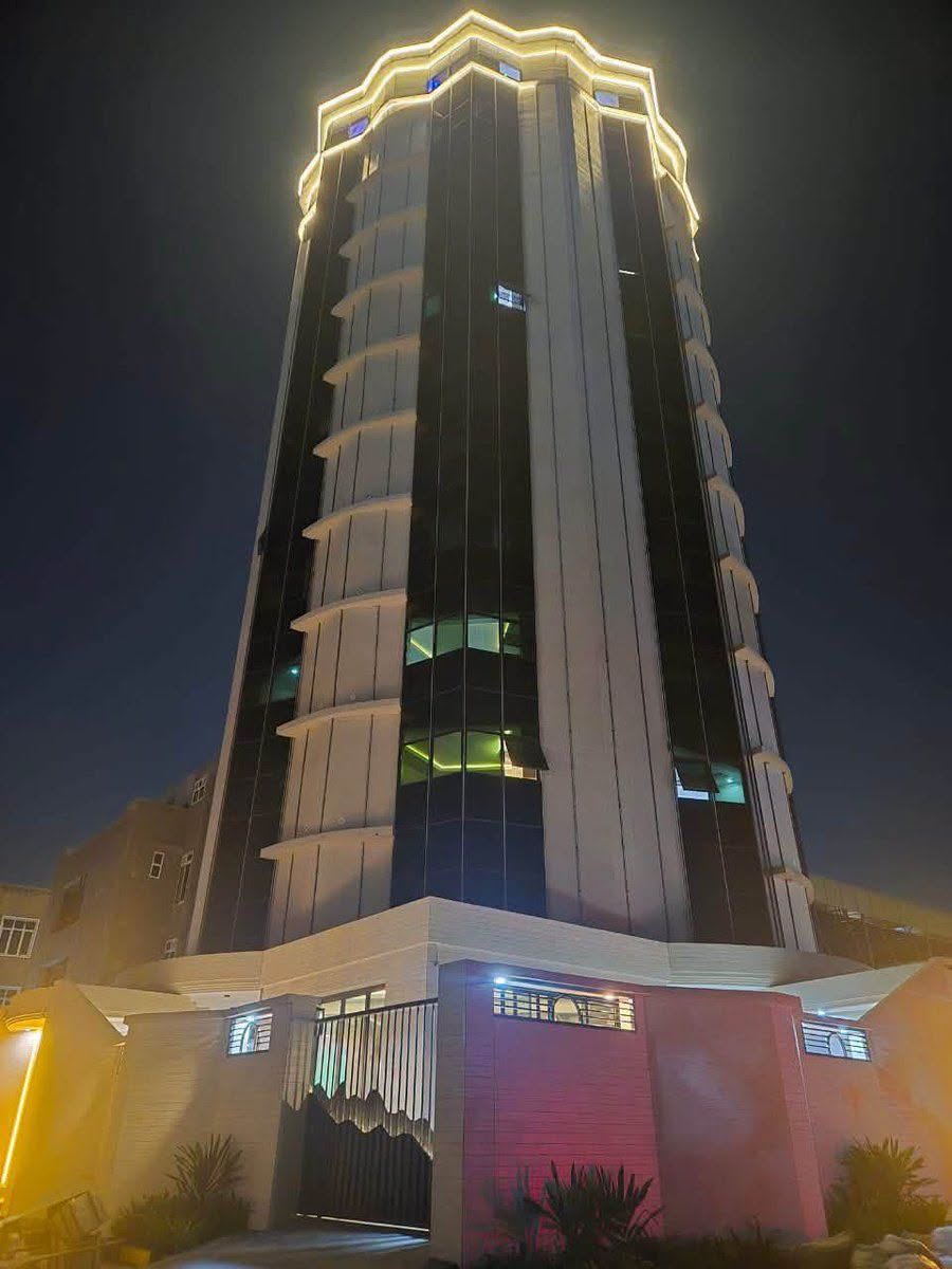 TOHA Hotel illuminated at night